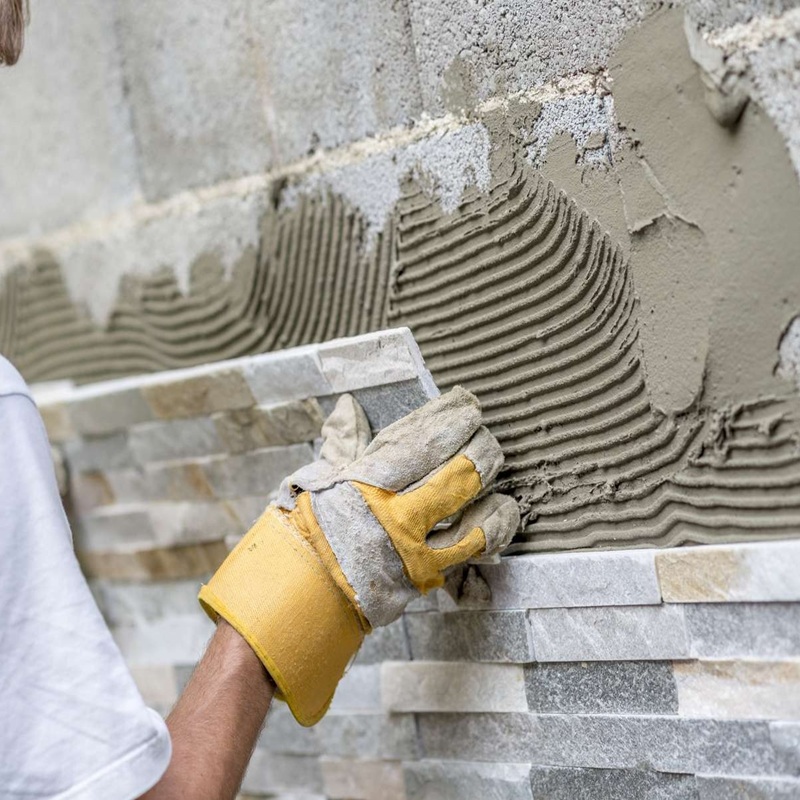Pose de parement mural en pierre - Blog