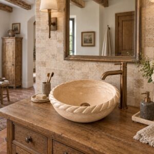 Vasque ronde en travertin beige torsadée